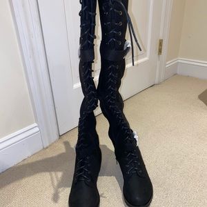 Edgy thigh high boots
